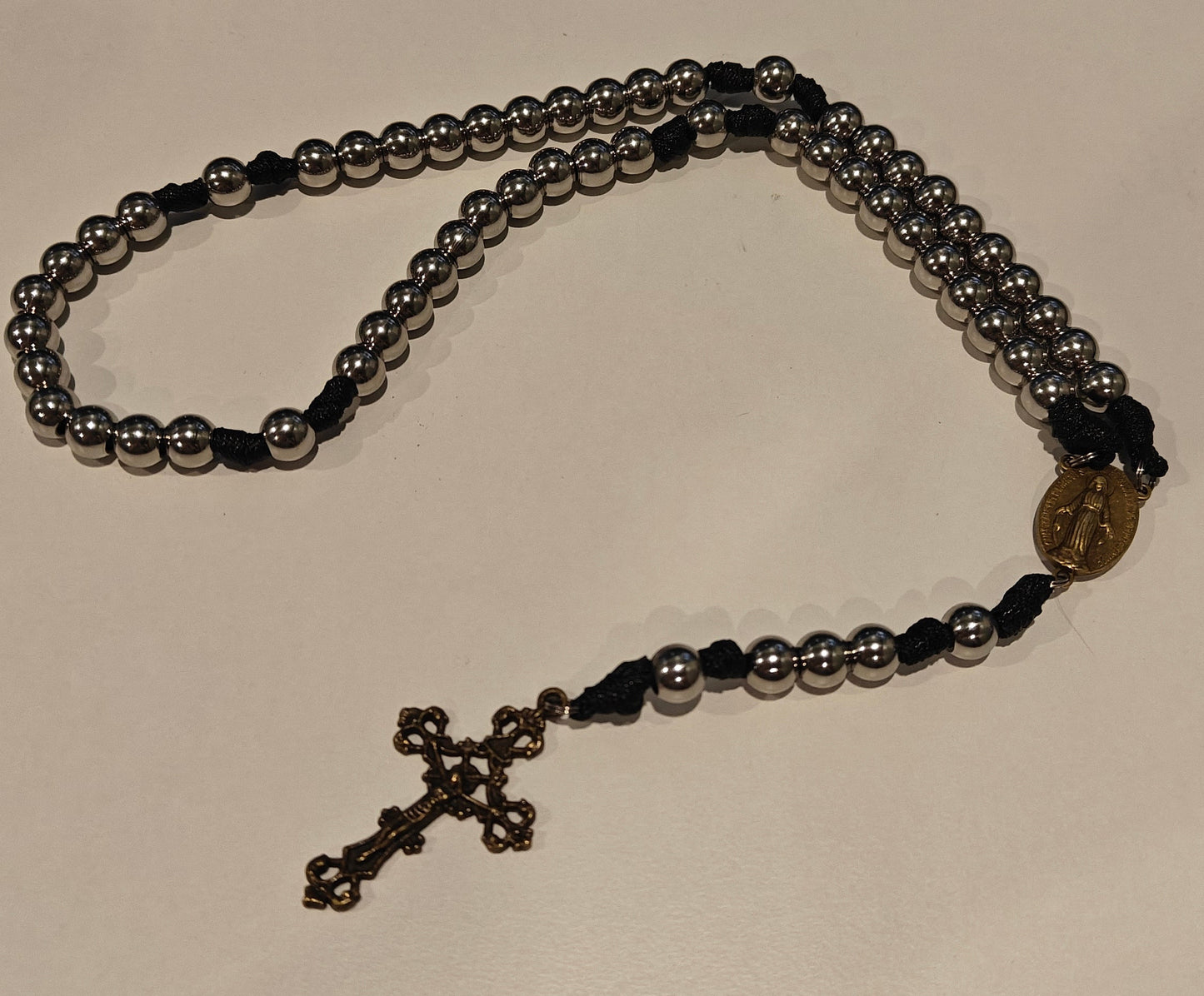 black gutted paracord rosary with bronze miraculous medal and bronze crucifix